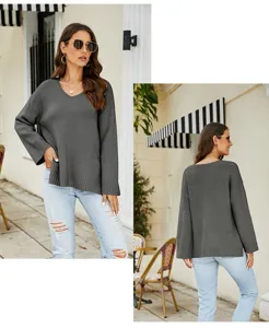 Detailed view of women's dark gray long sleeve V-neck knit sweater in a casual loose fit style.