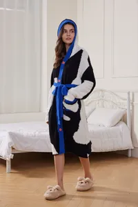 Detailed view of the thickened plush hooded loungewear robe in cozy contrasting colors.