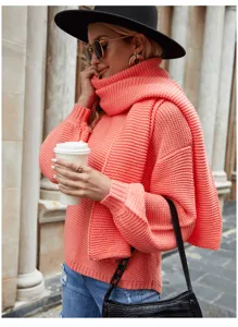 Vista detallada del jersey oversize de punto grueso para mujer con bufanda a juego invierno.