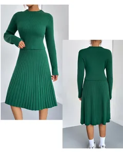 Detailed view of the dark green knit sweater and pleated skirt two-piece set, cozy knit.