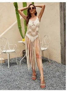 Beige crochet fringe beach cover-up, sexy hollow out strap design for summer vacation style.