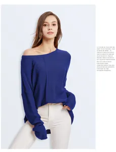 Detailed view of women's royal blue off-shoulder knit sweater, relaxed fit and soft texture.