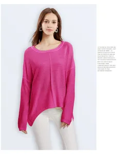 Close-up of the pink knit sweater showing soft texture, drop shoulder design, and loose fit.