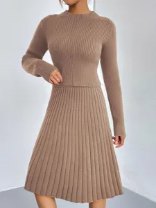Solid color knit sweater two-piece set, slim fit long sleeve top and A-line midi skirt.