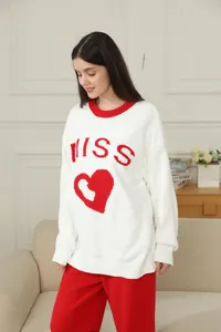 Women winter coral velvet pajama set with heart and letter print, long sleeve home wear.