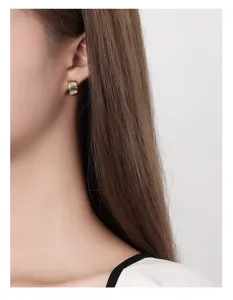 Wide surface brushed sterling silver earrings French minimalist stud detail shot for women.