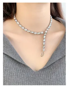 Grey baroque pearl necklace with metal ring pendant, elegant vintage style clavicle chain.