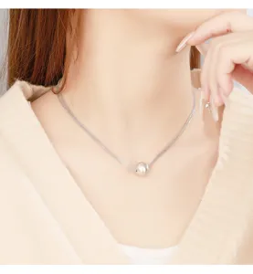 Exquisite multi-strand silver necklace with round ball pendant, minimalist fashion jewelry.