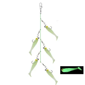 Detailed view of sea fishing multi-hook rig with glow soft plastic lures for effective night luring.