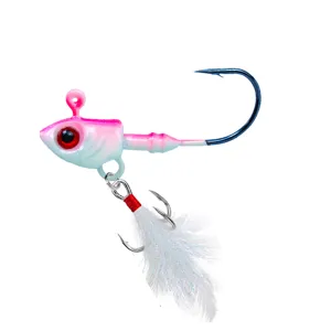 Close up detail view of pink and white fishing jig head lure with feathered treble hook.