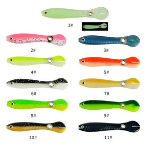 Soft fishing lure color variants detail view, paddle tail swimbait with glowing eyes and scales.