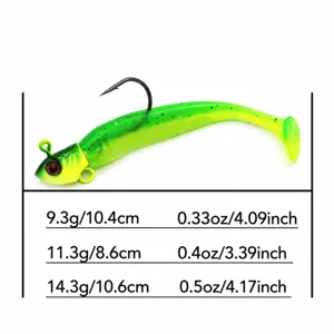 Green yellow T-tail soft fishing lure with jig head, multiple sizes available.