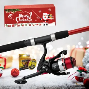 Christmas fishing rod set detail featuring spinning reel, carbon rod and holiday gift box.
