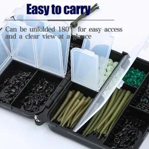 Carp fishing tackle box set with swivels, beads, and hoses for outdoor fishing use.
