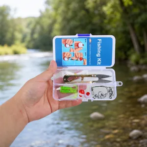 Portable fishing kit box with scissors, soft baits, bobbers and hooks for outdoor gear.