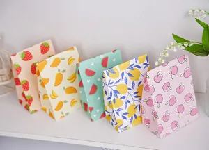 Cute fruit pattern paper gift bags detail view, perfect for candy packaging and small presents.