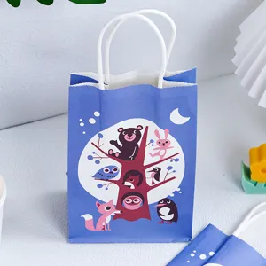 Detailed view of a blue cartoon animal paper gift bag with white handles and cute night forest print.