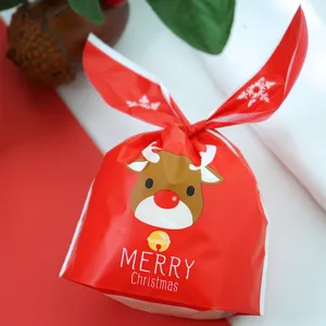Cute Christmas rabbit ear gift packaging bag, red candy snack pouch with cartoon reindeer.