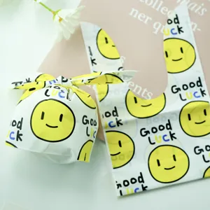 Niedliche Smiley-Gesicht Kaninchen Geschenktüte und Süßigkeiten Verpackung Detailansicht.