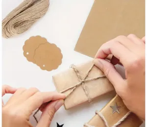 Kraft paper tag and twine packaging detail shot showcasing handmade gift wrapping materials.