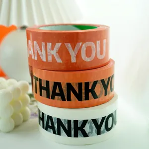 Detail shot of stacked decorative packing tapes featuring Thank You print, INS style.