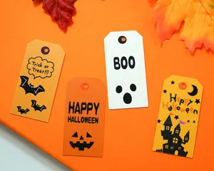 Halloween paper gift tags detail showing four spooky designs with bats, ghosts and pumpkins.