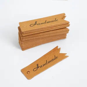 Vintage kraft paper tags with handmade print, perfect for DIY jewelry and gift wrapping use.