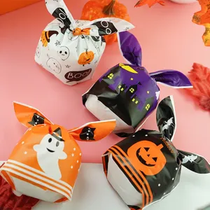 Halloween candy gift bags with cute rabbit ears design, perfect for party favors.