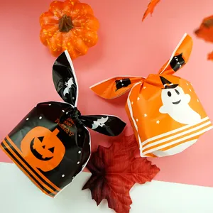 Halloween rabbit ear candy gift bags set, cute pumpkin ghost packaging for festive treats.
