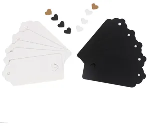Detailed view of scalloped rectangular paper tags with heart cutout, craft gift labels set.