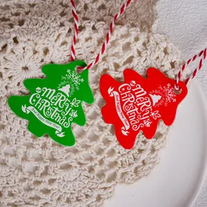 Christmas tree shaped red green paper tags holiday gift message cards hanging decor