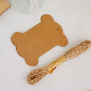 Kraft paper bone shape tags and jute twine detail, perfect for DIY craft and gift hanging.