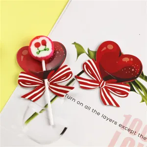 Red heart bow lollipop decorative paper card detail showing the exquisite bow design.