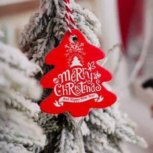 Christmas tree wooden hanging tag ornament red holiday party decor closeup detail view
