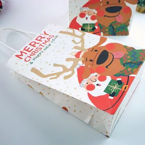 Christmas gift paper bag detail showing festive reindeer and Santa Claus design with handle.