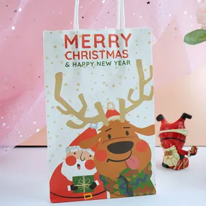 Christmas gift paper bag detail view with cute reindeer and Santa Claus print for holiday packaging.