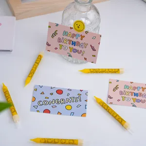 Cute birthday greeting cards set with cheerful smiley face candles for gift wrapping celebration.