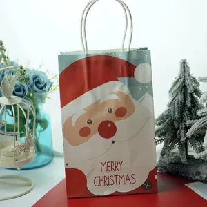Christmas paper gift bag with cute Santa design, ideal for holiday presents and packaging.