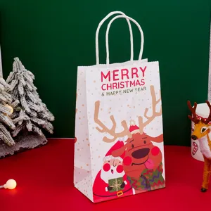 Christmas paper gift bag with cute reindeer and Santa print, festive holiday candy packaging bag.