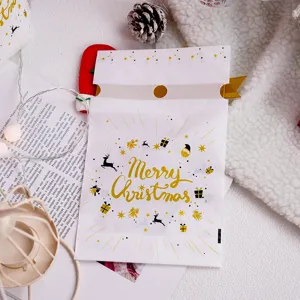 Christmas candy and cookie packaging bag detail, gold foil festive design pouch.