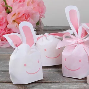 Sacs cadeaux oreilles de lapin bonbons emballage joli design visage souriant fête