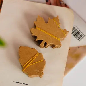 Kraft paper leaf hang tags for DIY jewelry crafts, gift cards, and vintage decoration.