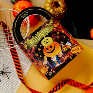 Halloween candy box detail view, festive gift packaging with cute pumpkin and animal graphics.