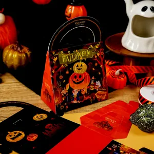 Halloween candy gift box detail view, paper packaging with festive pumpkin print design.