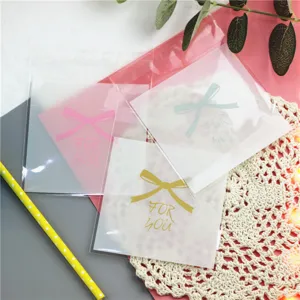 Rosa Schleife selbstklebende Geschenktüten für Kekse Schmuck, süßes Verpackungsdesign.