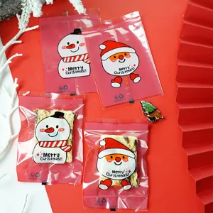 Christmas plastic packaging bags for cookies and bakery gifts, cute snowman and Santa designs.