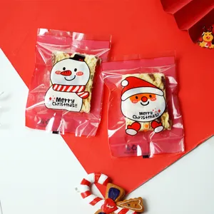 Christmas self-sealing packaging bags, cute snowman and Santa designs for cookies.