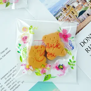 Transparente selbstklebende Geschenktüten mit Blumenmuster für Kekse und Präsente.