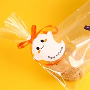 Halloween ghost decorative paper tag detail view for handmade gift packaging and holiday decor