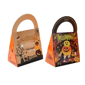 Close-up detail of Halloween candy packaging boxes featuring cute pumpkin and ghost patterns.